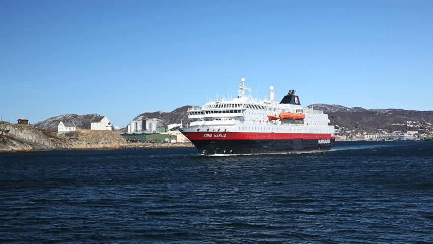 BODOE, NORWAY - MAY 2013: Along the coast of Norway the Hurtigruten ship is