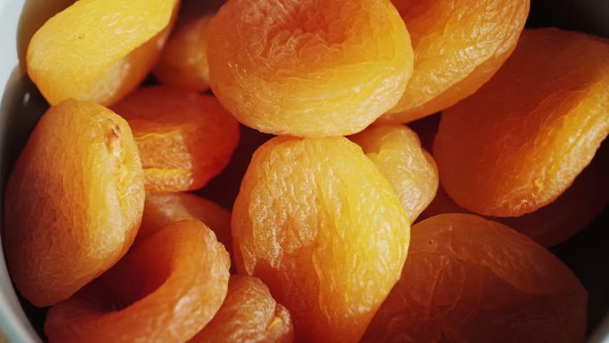 Dried apricots close-up. Dry apricot fruit food. Delicious healthy sweet dessert.