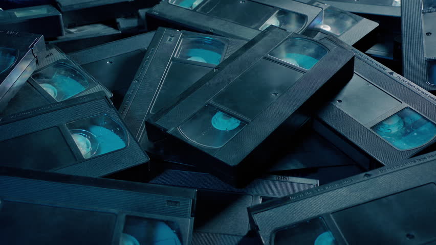 Lots Of VHS Tapes Moving Shot
