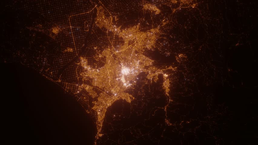 Sapporo (Japan) top view at night. View on modern city from satellite. Camera is zooming in, rotating counterclockwise. Vertical video. The north is on the left side