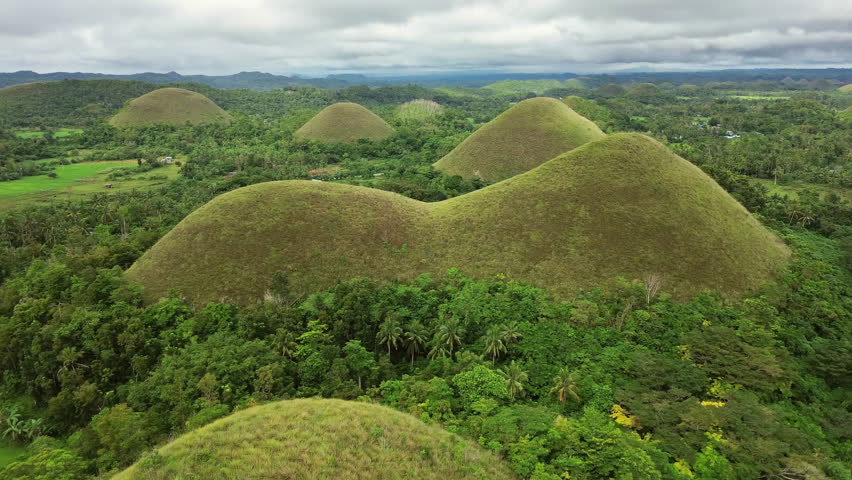 Aerial around view of Chocolate hills - geological formation on Bohol island, Philippines, 4k