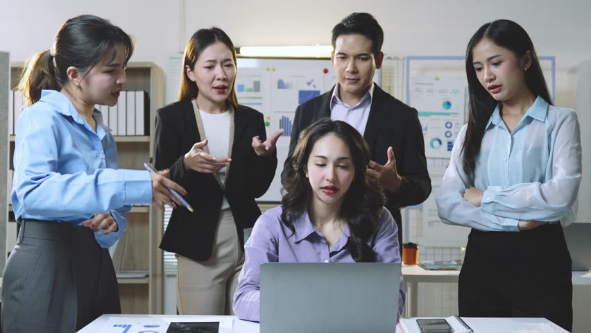 Professional team experiencing aggressive workplace tension, colleagues confronting each other during high stakes presentation, revealing communication breakdown and collaborative challenges