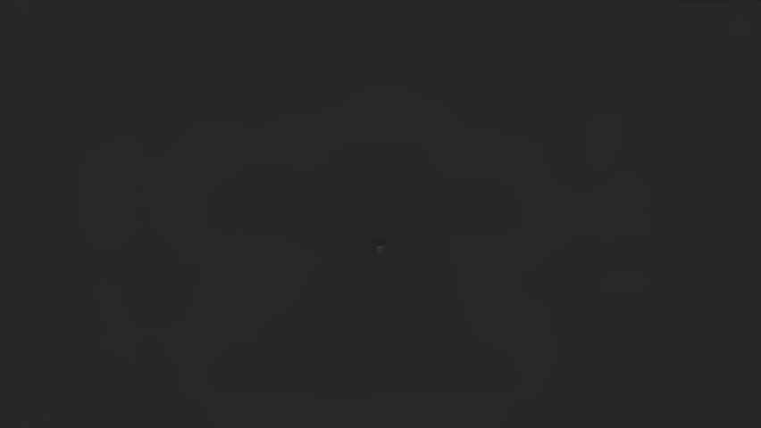 A clean, modern white camera logo on a dark gray background. Simple, abstract design representing photography.