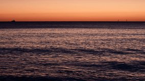 Soft morning glow rises over the Coral Sea as the last stars fade into the brightening sky, casting a tranquil light across the calm waters in a peaceful tropical dawn. - Powered by Shutterstock - Get 15% off with code: PIKWIZARD15