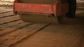 Road roller compacting soil at construction site - Powered by Shutterstock - Get 15% off with code: PIKWIZARD15