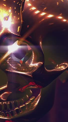Seamless vertical video animation of golden skull with flares. Cool Halloween background