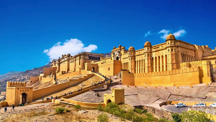Amer Fort in Jaipur, Rajasthan, India. UNESCO world heritage.Gorgeous view of the Amer Fort and Palace (Amber Fort) on blue sky background in Jaipur, Rajasthan, India. Rajput military hill architectur