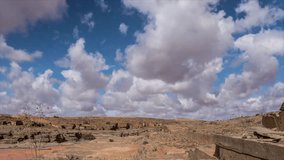 Arid Landscape Dramatic Clouds Sky Blue Desert Rocks Formations Stone Structures Dry Valley Nature Scene Summer Day Weather - Powered by Shutterstock - Get 15% off with code: PIKWIZARD15