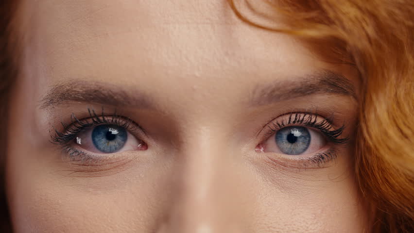 Half Face Blue Eyes, Natural Eyebrows. Minimal Make-Up, Red-haired Ginger Woman 