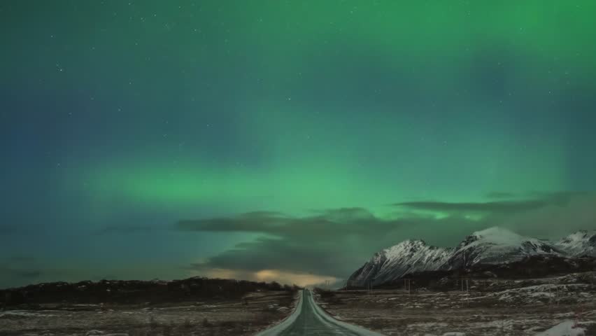 Lofoten Norway time lapse of the aurora borealis northern lights winter landscape at E10 road in Grundstad