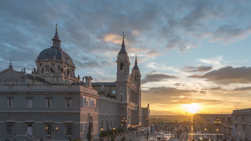 Madrid Spain time lapse day to night sunset city skyline at Cathedral de la Almudena