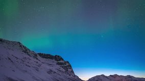 Tromso Norway time lapse of the aurora borealis northern lights winter landscape at Grotfjord - Powered by Shutterstock - Get 15% off with code: PIKWIZARD15