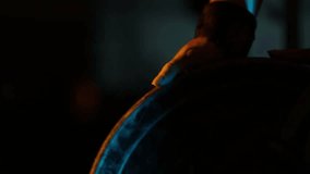 Close-up of an athlete's hands with wrist wraps grabbing a heavy weight plate. Dramatic blue and warm lighting creates a powerful, focused, and cinematic training atmosphere. - Powered by Shutterstock - Get 15% off with code: PIKWIZARD15