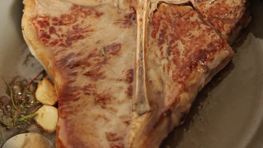 T-bone steak roast cut of meat juicy roast beef tasty snack fresh delicious gourmet food background on the table rustic food top view copy space