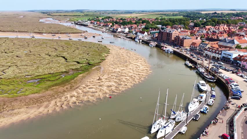 An aerial view of the harbour and marshes at Wells-next-the-Sea, Norfolk seen on 13 August 2025.