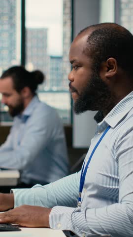 Vertical video Trader frightened by security alert on PC after hacker uses exploit to penetrate systems. Brokerage company worker responds to cyberattack, protecting client account from unauthorized