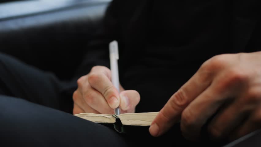 Business planning, notebook writing learning concept. Casual business man writing on notebook and working Man studying online course via laptop and lecture on notepad. - Powered by Shutterstock - Get 15% off with code: PIKWIZARD15