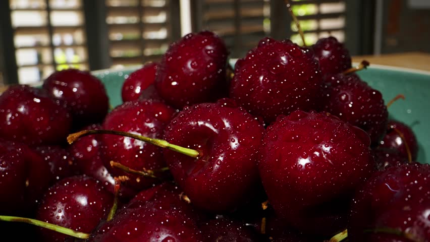 Seasonal cherry macro, red berry. Rotated organic red cherries background.