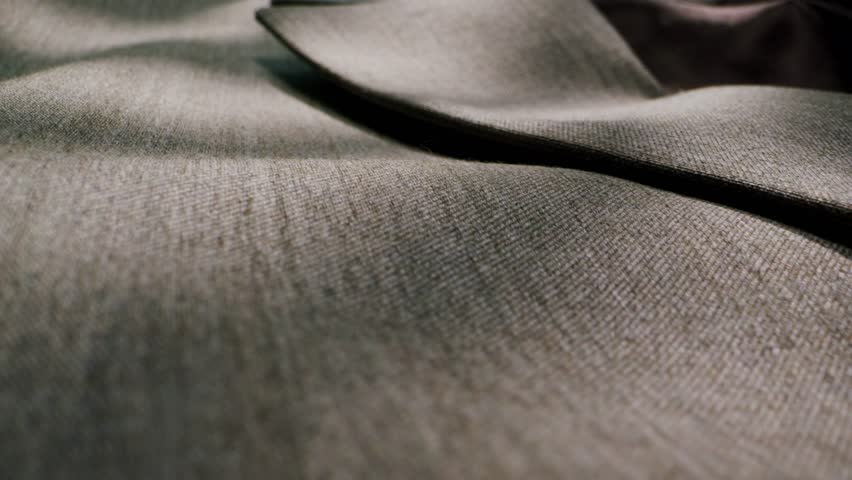Elegant Tailored Suit shirt featuring Classic Buttons and exquisite details, texture textile close up macro