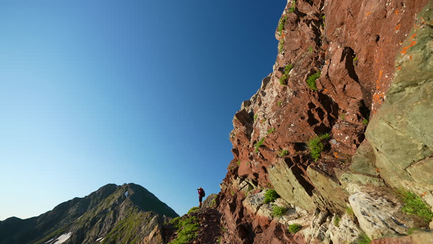 Landscape Photographer on Top of Ridgeline and Scenic Mountain Landscape. Phantom Terrace Venable Comanche Trail Loop, Colorado USA