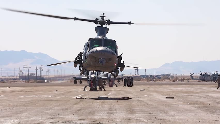 U.S. Marines with HMLA-367, 3rd MAW, conduct flight ops during SLTE 4-25 at Twentynine Palms, Aug. 11, 2025.