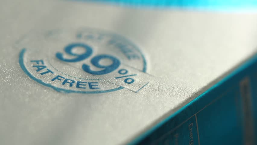 Fat free label on dairy product packaging reveals nutrition facts