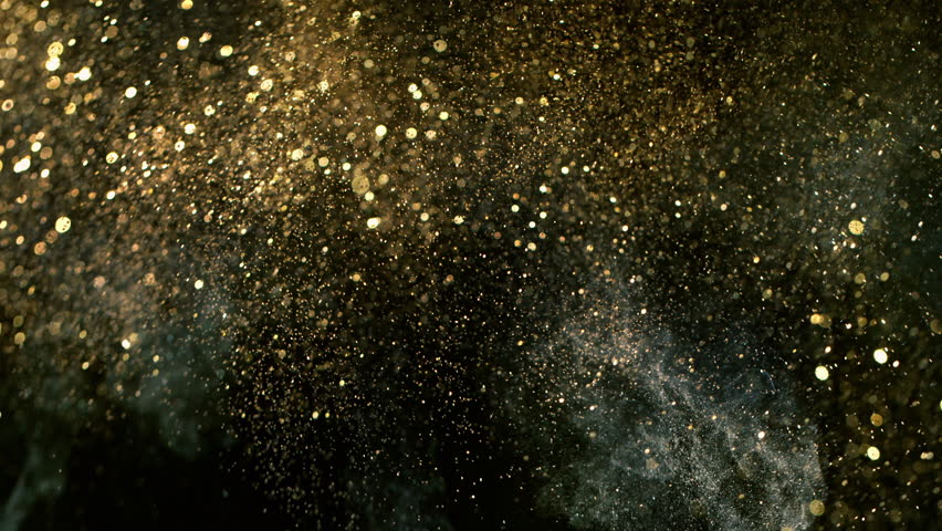 Super Slow Motion Shot of Glittering Golden Background at 1000fps.