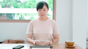 Asian woman working with futuristic augmented reality interface, using virtual AI assistant technology for online business and smart home control on a holographic screen. - Powered by Shutterstock - Get 15% off with code: PIKWIZARD15