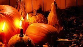 Thanksgiving and Halloween background.Pumpkins and glowing candles. 4k footage - Powered by Shutterstock - Get 15% off with code: PIKWIZARD15