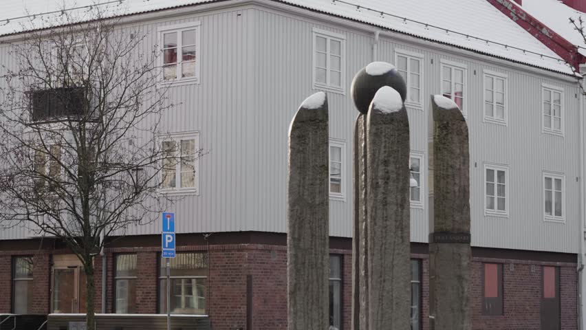 Urban sculpture and building at Hollandareplatsen, Gothenburg winter scene