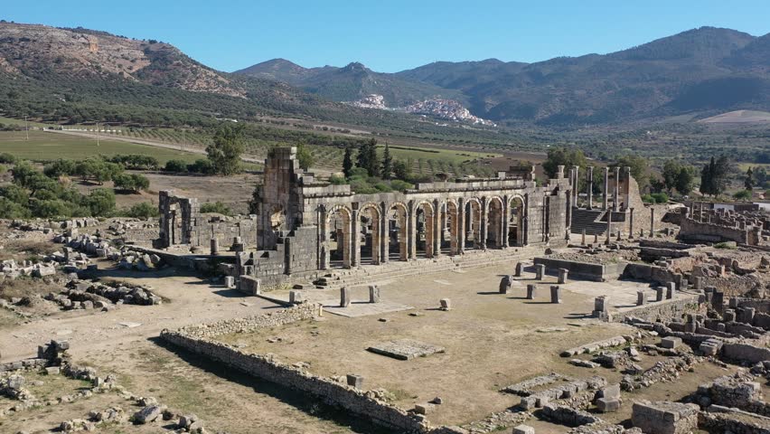 Volubilis, an ancient city in Morocco, thrived under Roman rule and is renowned for its archaeological ruins, intricate mosaics, and historical importance in North Africa.
