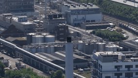 pharmaceutical industrial production site in Pratteln, Switzerland, focusing on industrial area, pharma industry, and manufacturing infrastructure. Aerial video. - Powered by Shutterstock - Get 15% off with code: PIKWIZARD15