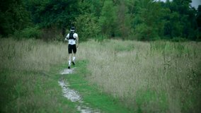 Trail Runner Active Exercising Before Marathon. Exercising Outdoors For Health And Fitness. Trail Running Athlete Training Endurance Race With Hydration Vest. Runner Jogging On  Dirt Path. Trail Run.  - Powered by Shutterstock - Get 15% off with code: PIKWIZARD15