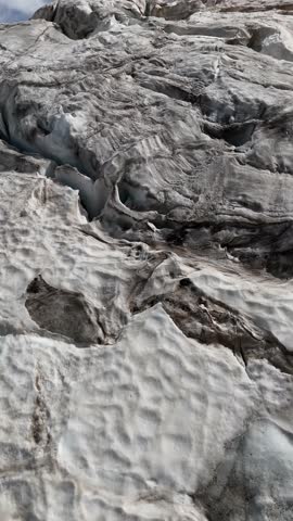 Flight over open crevasses on Mont Blanc glacier