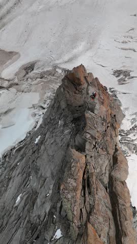 Aerial view of a rock pinnacle summit on Mont Blanc