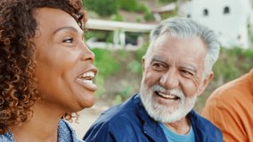 Close Up Of Group Of Senior Friends On Hike In Countryside Talking And Laughing Together - Powered by Shutterstock - Get 15% off with code: PIKWIZARD15