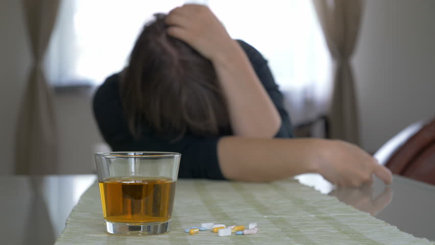 Acohol and drugs abuse. Drunk or sick woman.