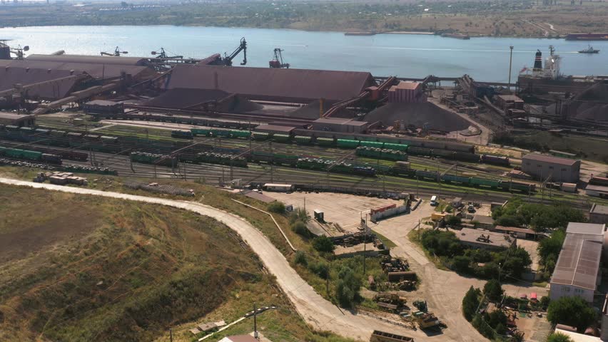 Aerial view of railway depot in a sea port. Logistic and transportation.