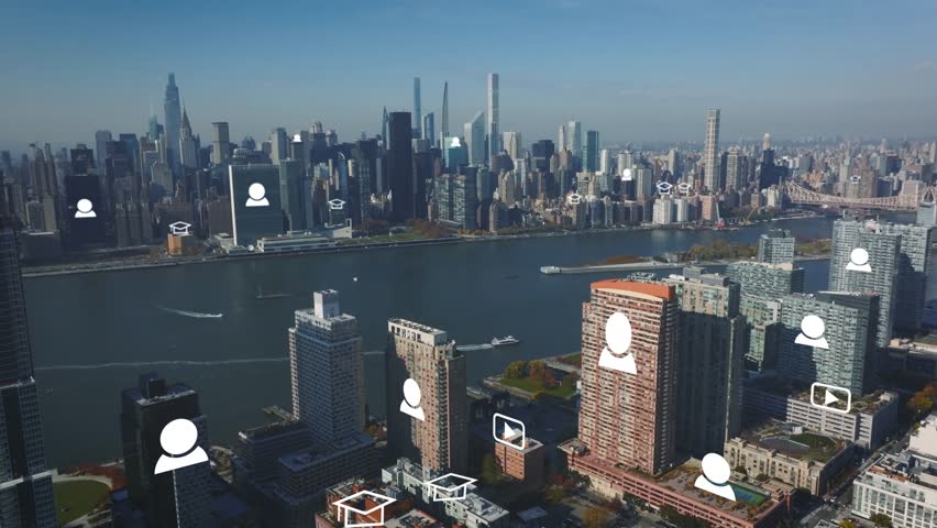 A stunning aerial view of the New York City skyline visualizes a smart city network. Digital icons for social media, communication, and e-learning float above buildings, symbolizing global connectivit - Powered by Shutterstock - Get 15% off with code: PIKWIZARD15