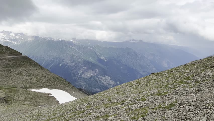Stunning Mountain Landscape With Clouds and Greenery in Switzerland