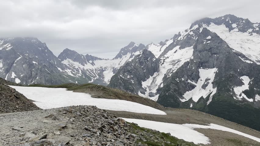 Exploring Stunning Snow-Capped Mountains in a Remote Valley Setting