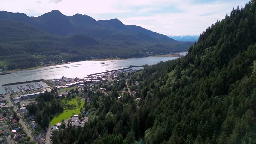 aerial reveal of juneau alaska over mountain
