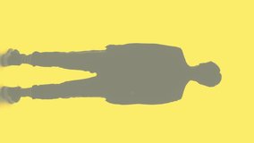 Vertical video. Male silhouette. Leader ambition. Double exposure back view outline of smart business man turning head isolated on yellow. - Powered by Shutterstock - Get 15% off with code: PIKWIZARD15