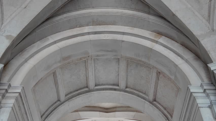 Lisbon Palace of Ajuda interior dome with arches statues and classical symmetry
