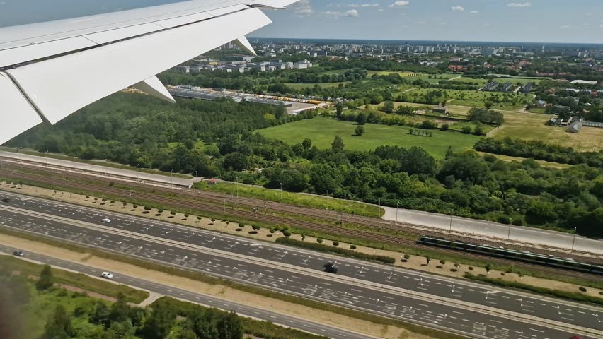 Ground Transportation in Suburbs of Warsaw, Poland Near Airport, Airplane Passenger POV Before Landing