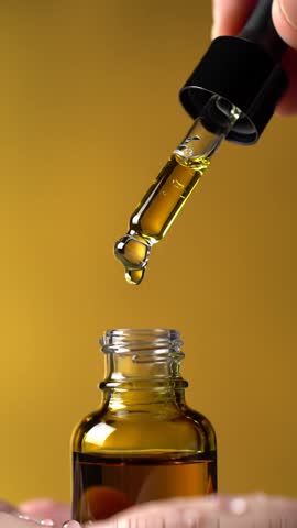 Golden Beard Oil Droplet Falling in Slow Motion  Cinematic Close Up 4K
