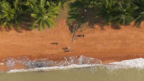 Aerial View of Community Volunteers Cleaning Coastal Beach for Environmental Sustainability and ESG Initiative - Powered by Shutterstock - Get 15% off with code: PIKWIZARD15