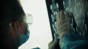 Doctor Holding X Ray. Medical Research Specialist. Scientific Medical Study. Physician Examining Results. Medical Imaging Analysis. Doctor In Clinic. Medical Diagnosis Process. Patient Diagnosis Scan - Powered by Shutterstock - Get 15% off with code: PIKWIZARD15