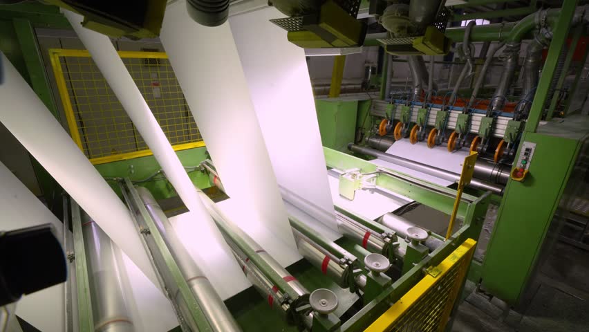 Production of office paper. The machine cuts paper into A3 sheets