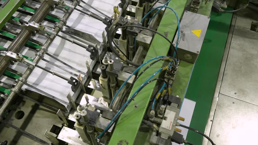 Production of office paper. The machine cuts paper into A3 sheets  